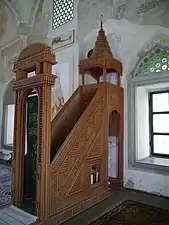 The minbar or pulpit. Both the minbar and the kürsü are made from rosewood.