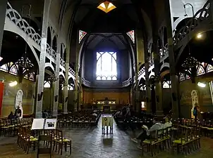 The nave facing the altar, showing the lightweight steel framework.