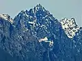 Merchant Peak centered, with the southeast subsidiary subpeak (5,831 ft) to the right. The subpeak is mistakenly labelled as Merchant Peak on old USGS maps.