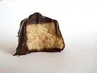 Peanut butter fudge covered in ganache