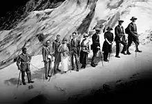 Peter Kaufmann (far right) leads a group of tourists across the upper Grindelwald glacier (ca. 1920)