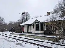 TH&B Jerseyville station and TH&B steam locomotive #103 in their new permanent location at Westfield Heritage Village