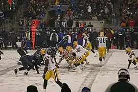 Favre under center at a rare snow-covered Qwest Field