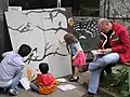 Collaborating on a bird canvas on an Open Day