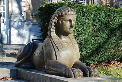 One of the sphinxes lining the staircase