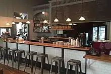 Restaurant counter with stools