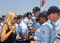 Image 23Playmate of the Year and People for the Ethical Treatment of Animals spokesperson Pamela Anderson, signing DVDs at the USS Halsey