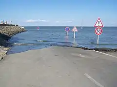 Flooded causeway (island side).