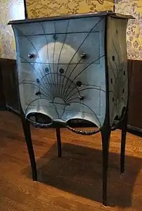 Art Deco festoons on a commode, by Paul Iribarne Garay, c.1912, mahogany and tulip wood frame, slate top, green-tinted shagreen upholstery, ebony knobs, base and garlands, Museum of Decorative Arts, Paris