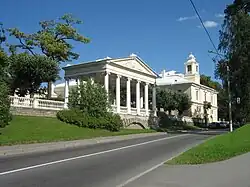 Entrance to the park with pavilion "Three Graces"