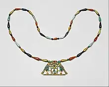 Pectoral and necklace of Princess Sithathoriunet; 1887–1813 BC; gold, carnelian, lapis lazuli, turquoise, garnet & feldspar; height of the pectoral: 4.5 cm; Metropolitan Museum of Art