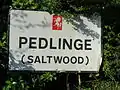 The Kent County Council signboard for Pedlinge, showing its dependence upon Saltwood.