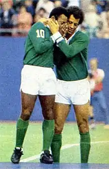 Pelé in tears, hugged by teammate Carlos Alberto