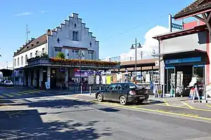 Three-story building with stepped gable roof