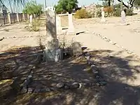 The grave of  Tom Graham in the "K of P & A.O.U.W. Cemetery" section.