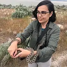 Rosemary Mosco holding a gopher snake.