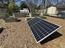 Photovoltaic solar panels provide clean electricity for this land lab.  Using local power to operate garden tools, sensors, cameras, and water pumps provides a great example of sustainable energy for students.