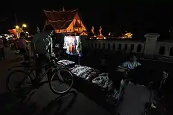 A local street vendor by the Wat Phumin at night