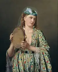 A lady from the Ottoman court playing the Def at the Harem