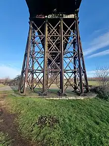 Metal bridge pier made up of X-shaped metalwork