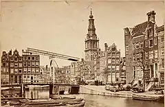 Houtgracht looking west towards Raamgracht. Background: Zuiderkerk tower, and to the left the Zwanenburgwal. 1867