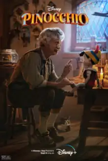 An elderly human man, Geppetto, speaks to a living wooden puppet, Pinocchio, in a house filled with cuckoo clocks. A bluish light shines through a window on Geppetto and Pinocchio.