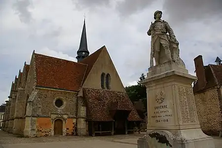 Church at Unverre with Charpentier's war memorial in foregroundEure-et-Loir.