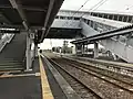 A view of the platforms and tracks from platform 1. Note the elevator serving platforms 2 and 3.