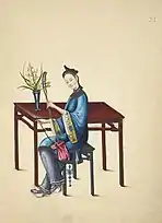 Woman playing a jinghu.