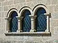 Romanesque arches and columns on the side façade