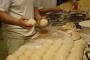 3: Loaves of the dough ready for insertion into the scrolling device