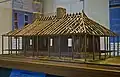 A model of the Maison Bolduc showing poteaux-sur-solle construction.