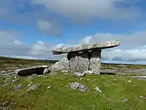 Poulnabrone dolmen, a Neolithic portal tomb about 1 kilometre (0.62 mi) north of Caherconnell ringfort.