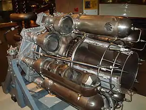 Power Jets W.2 for its initial installation in the Gloster E28/39 was tested with no diffusion from the turbine exit Mn of 0.8. The turbine blade annulus area was used for the length of pipe necessary to reach the tail of the aircraft. The exhaust reached the speed of sound at a low thrust but at the turbine temperature limit due to the excessive pressure loss and frictional heating. Diffusion was added behind the turbine with the cone shown to reduce the pipe entry Mach number.