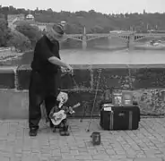 A puppeteer manipulating a marionette in Prague, Czech Republic