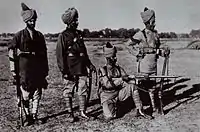 Soldiers of the Queen's Own Corps of Guides of the British Indian Army in 1897. They are in various orders of uniform but all wear puttees.