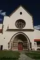 Portal of the church with tympanum