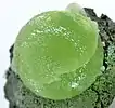 A 2 cm prehnite ball of top quality and color