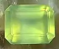 Emerald cut prehnite, 1.85 cm × 1.42 cm, 4.6 grams.