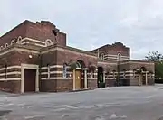 Eastern Cemetery chapel, central building on a symmetrical trapezoidal plan, flanked by two rectangular plan chapels. built 1931 (2014)