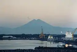 Puerto Quetzal seen at dawn, with the volcanoes on the horizon

Puerto Quetzal Cruise Port facilities