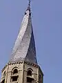 A spiraled church tower roof, cloister, Loiret, France