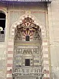 Trilobed entrance portal with groin vaults and muqarnas at the Funerary complex of Qaytbay (1474)