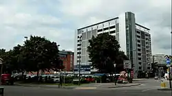 Photograph showing a multi-story car park on the former site of Queens Hall.