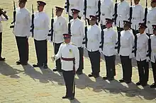 The Royal Gibraltar Regiment at the parade for the Queen's Birthday (Trooping the Colour), Grand Casemates Square, Gibraltar in No. 3 Dress