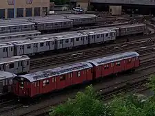 A pair of R30 BMT Redbirds (since scrapped) stored at Jerome Yard