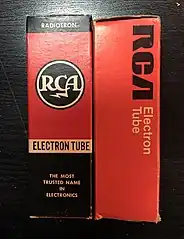 Two vacuum tube cartons, displaying different generations of the RCA logo