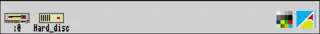 Screenshot of the icon bar under RISC OS 2 showing the following: Left portion, from left –  Discs (in this case a floppy disc and hard disc), Right portion, from right –  Task Manager, Display Manager
