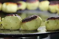 Patties being prepared by street vendor in Powai