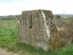 One of a pair of blocks that allowed the railway line to be blocked quickly by inserting a barrier such as a section of rail. The rail block was intended to stop enemy tracked vehicles from travelling along the railway route. The mass of concrete stands on a foundation and is about 5 feet (1.5 m) high.